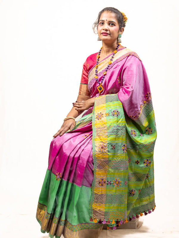 Silk pink by green, golden border saree with Sandur lambani embroidery